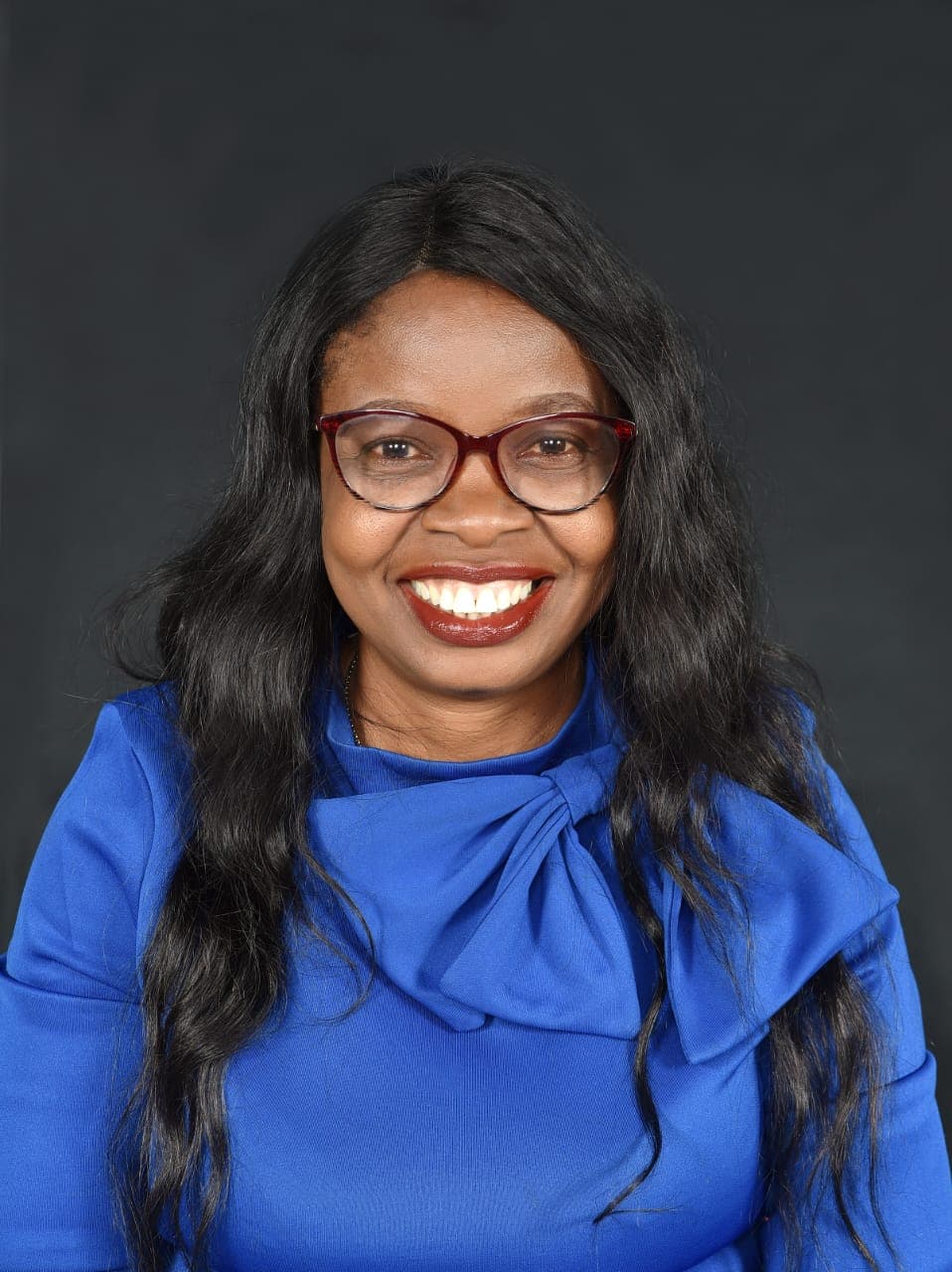 Mrs. Chinwe Ozoigbo. - Head Teacher (Campus 1).